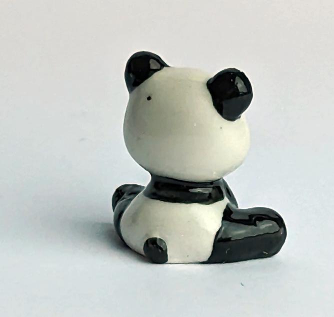 sitzender Panda 